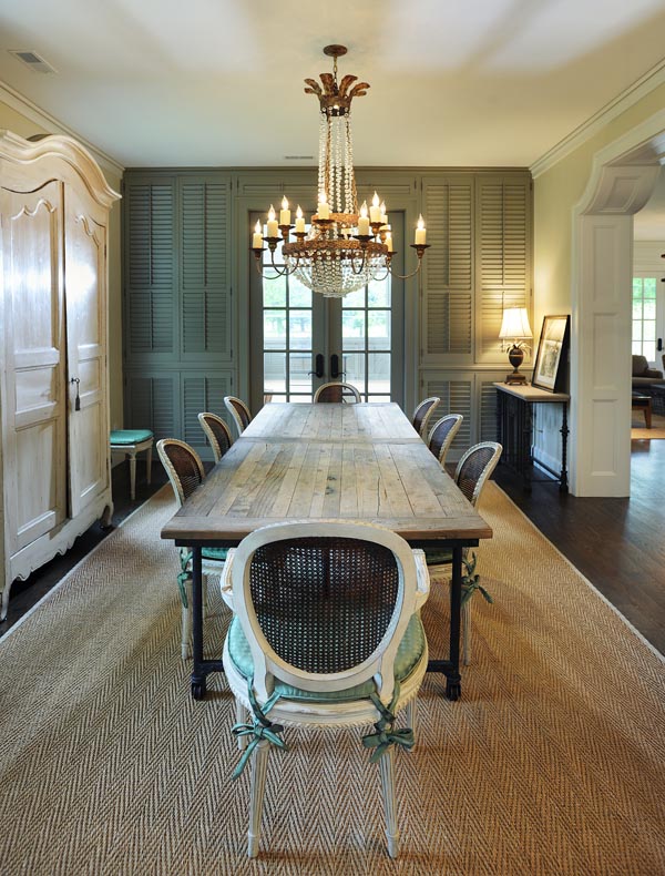 Another view of the Inviting and sustainable dining area by Mossy Ridge, designed for memorable gatherings and the wall of shutters 
