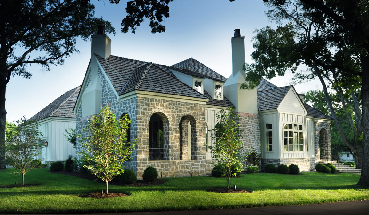 Exterior view of a Mossy Ridge eco-friendly home in suburban Nashville, featuring a blend of traditional architecture with sustainable, natural materials.